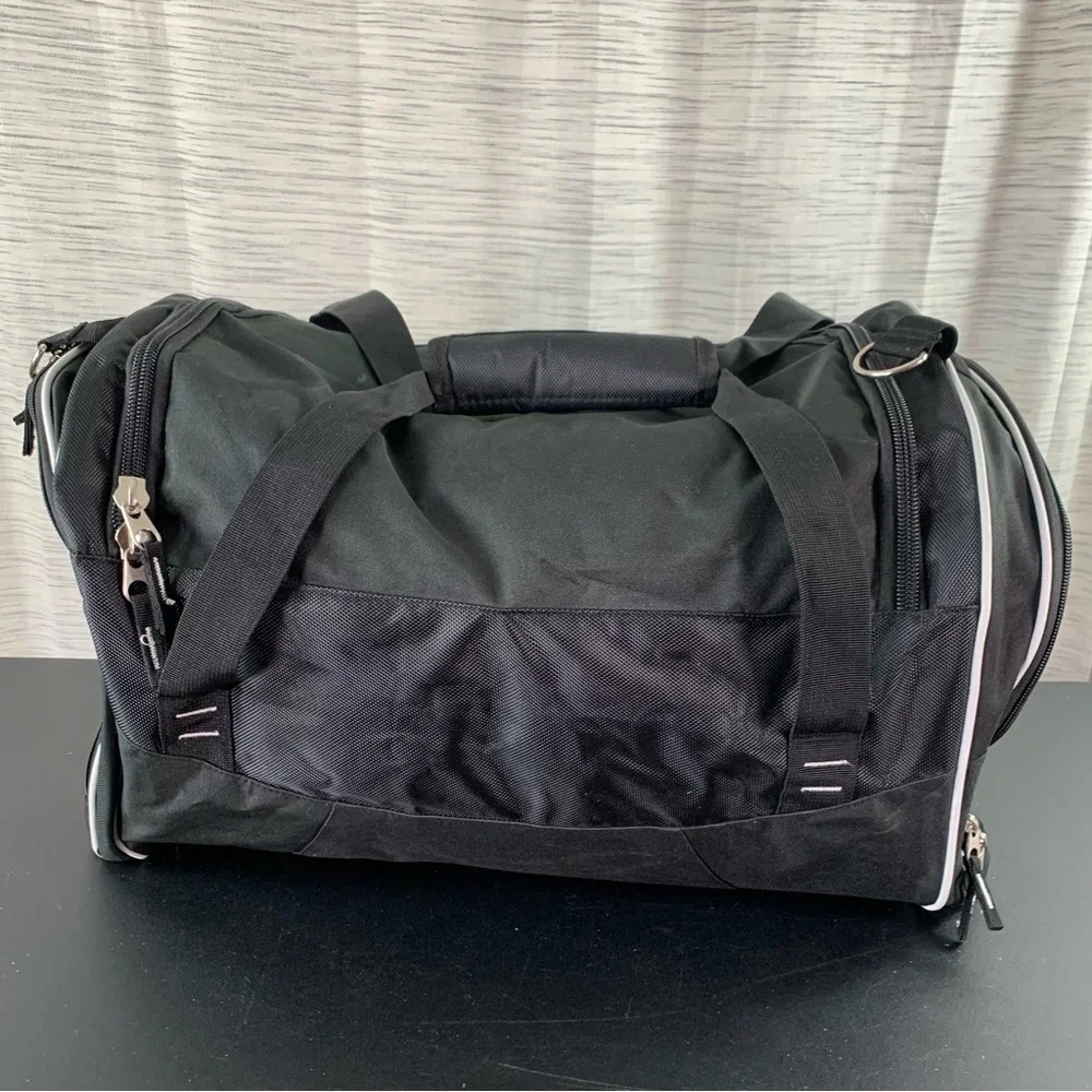 A Black 100th Anniversary Duffel Bag (Masonic?).
